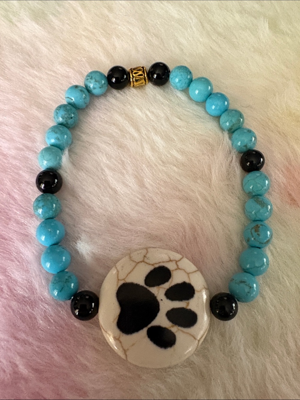 Hand Crafted Turquoise Blue and Black Paw Print Stretch Bracelet
